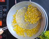 A picture of step 1 of Masala corn Street style.