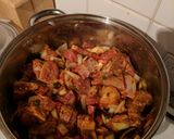A picture of step 1 of Punjabi Lamb curry served with rice.