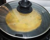A picture of step 3 of Besan ka cheela.