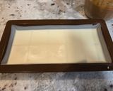 Foto del paso 6 de la receta: Turrón de chocolate blanco relleno de Lotus