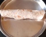 A picture of step 5 of Roti Roll with Cheese Spread.