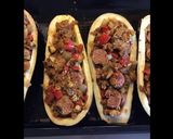 Une image de l'étape 5 de Aubergines farcies saucisses Strasbourg champignons poivrons épices cajun et scamorza grillée.