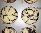 A picture of step 8 of Eggless marble cup cake.