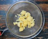A picture of step 2 of Oeufs Mimosa (French-Style Devilled Eggs).