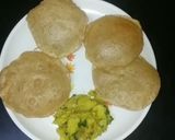 A picture of step 18 of Poori aloo.