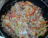 Foto del paso 3 de la receta: Arroz de molleja y corazón de pollo.