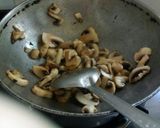 A picture of step 1 of Mushroom masala.