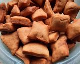 A picture of step 8 of Mandazi-ginger.