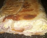 Foto del paso 4 de la receta: Tarta arrollada de jamón, queso y huevo (pascualina)