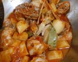 Foto langkah ke 7 dari resep Gulai Ayam Daun Kemangi.