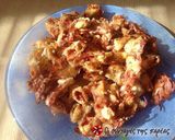 A picture of step 6 of Kalamarakia in the oven as if fried.