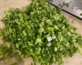 A picture of step 3 of Chicken Hearts Yakitori style (no skewer) Leek Green on top.