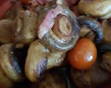 A picture of step 7 of My Butter Fried Pansetta Garlic mushrooms and cherry Tomatoes.