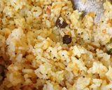 A picture of step 4 of Garlic masala rice.