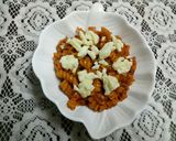 A picture of step 7 of Cheesey spiral Pasta in red sauce.