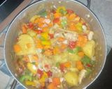 A picture of step 8 of Potatoes and Chicken Curry Pottage by Ogechukwu Mbanugo.