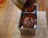 A picture of step 3 of Easy! Creme Caramel / Giant Flan used a loaf pan.