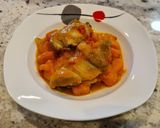 Foto del paso 8 de la receta Jamoncitos de pollo guisados con boniato y tomate