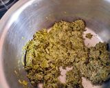 A picture of step 2 of Bathua saag tempered with ajwain,ginger & red chilli powder.