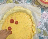 Foto del paso 4 de la receta: Pastel de hojaldre con jamón york, queso y tomatitos cherry para niños 👦🏻👶🏼