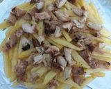 A picture of step 7 of Dynamite cheese loaded fries.