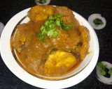 A picture of step 11 of Fish Korma.