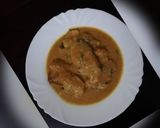 A picture of step 7 of Coconut chicken curry.