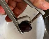 A picture of step 1 of Cherry Compote 🍒.