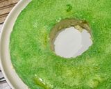 A picture of step 10 of Green Pudding with the hint of coconut powder and Pakola syrup.