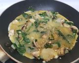 A picture of step 5 of Cheesy spinach omelette.