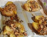 A picture of step 5 of Chilli garlic smash baked potato.