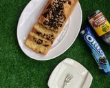 A picture of step 11 of Oreo vanillah cake loaf.