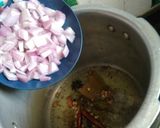 A picture of step 2 of Veg Pulav with Fruit Raita.