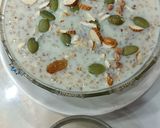 A picture of step 7 of Broken Wheat Kheer with pumpkin seeds.