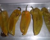 A picture of step 3 of Long Green Peppers Stuffed with Meat and Sauce.