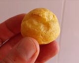 Foto del paso 5 de la receta: Miniprofiteroles rellenos de crema de limón con cobertura de toffee y crocanti