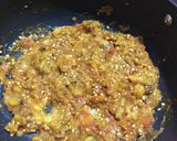 A picture of step 6 of Brinjal bharta.