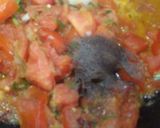 A picture of step 3 of Maggi in a cheesy tomato sausage.