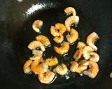 A picture of step 1 of Lentil Oats Porridge with Tomatoes and Prawns.