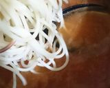 A picture of step 9 of #Sriracha_Ramen_Noodle #SoupWith#Finger_Fish_fry.