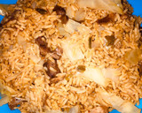 A picture of step 8 of Jollof rice with cabbage.