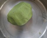 A picture of step 3 of Jowar Spinach Mathri.