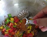 A picture of step 2 of Soyabean tricolor capsicum pulav.