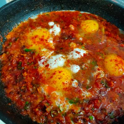 Ghee Tooria Per Eda Recipe - Parsi Style Ridge Gourd With Fried Eggs