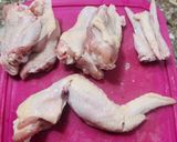 Foto del paso 1 de la receta: 🍗🥔🧅 Alitas de pollo al horno sobre colchón de papas y cebollas 🧅🥔🍗