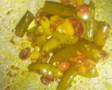 A picture of step 4 of Green chilli with karonde.