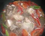 Foto langkah ke 5 dari resep Asem Asem Ayam Tanpa Kunyit.