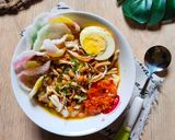 Foto langkah ke 6 dari resep Bubur Ayam Kuah Kuning.