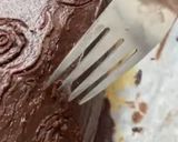 A picture of step 9 of Yule Log Cake.