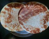 A picture of step 2 of Tawa pizza.